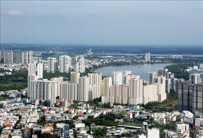 ‘Đòn bẩy’ thể chế cho bất động sản